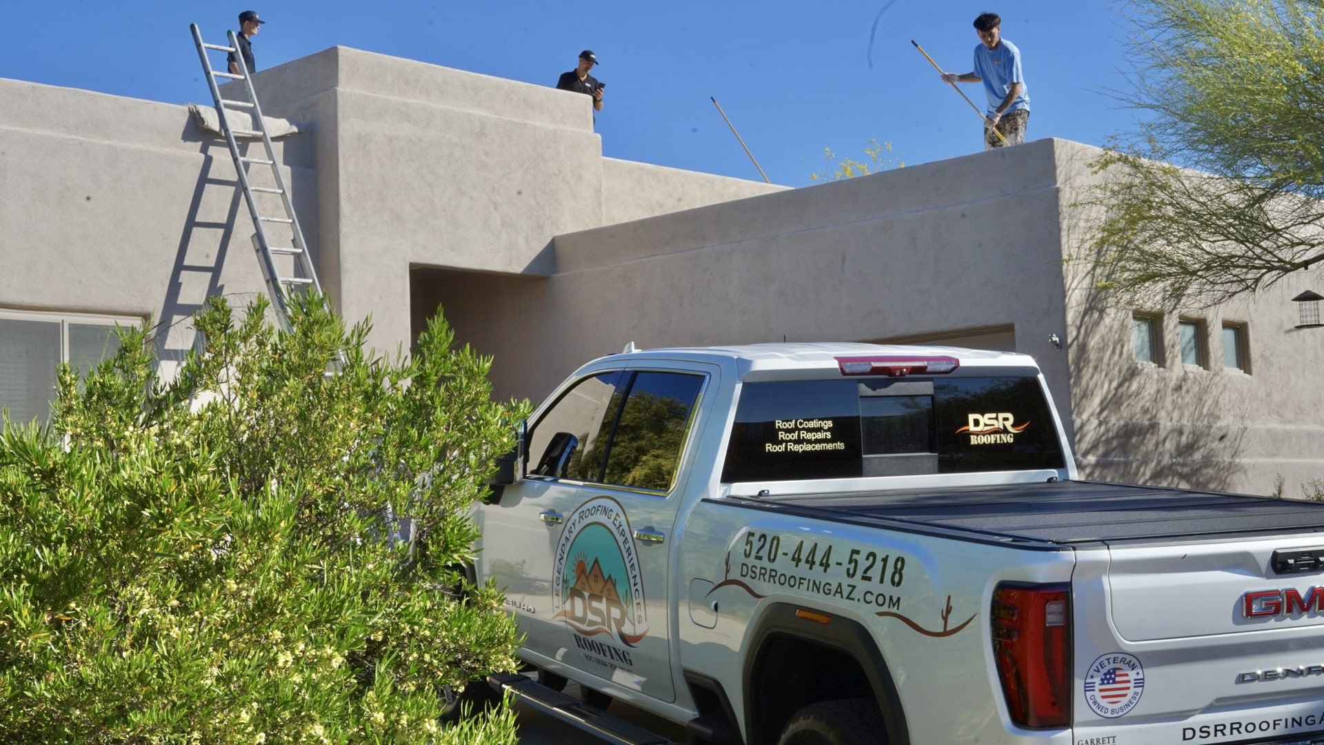 DSR Roofing branded truck and crew on-site in Tucson